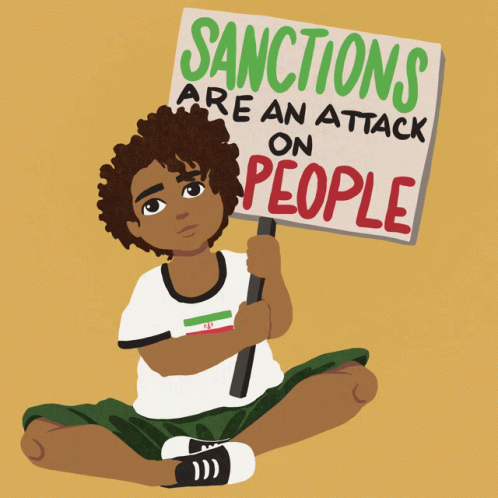 Sanctions Are An Attack On People, sanctions, End Sanctions, israel, palestine, protest, sign, children, child, Foreign Policy, Anti War, war, moveon, peace, nonviolence, gifnews, corrieliotta