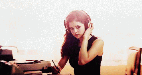 woman listening to music gif