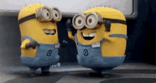 Two yellow Minions scream in joy