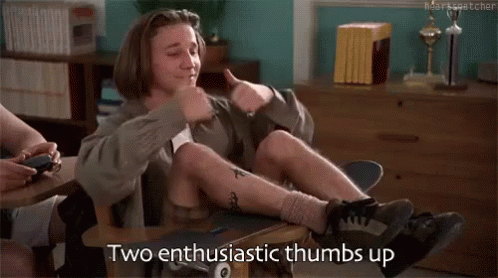 "Two enthusiastic thumbs up!" (GIF from the film "Clueless")