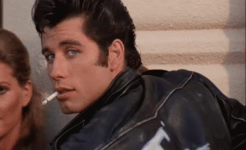 Smirk GIF - Smirk Smile Grease - Discover & Share GIFs