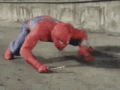 spider man hitting ground with wrench